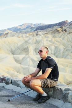 Royalty Free Photo of a Hiker Resting at Death Valley