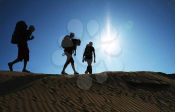 Royalty Free Photo of a Group Hiking in the Desert