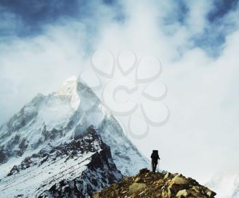 Royalty Free Photo of a Climber on a Slope in the Himalayan Mountains