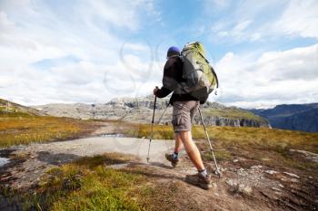 Royalty Free Photo of a Hiker in the Mountains of Norway