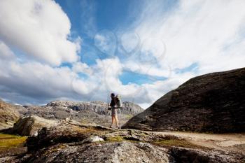 Royalty Free Photo of a Hiker in the Mountains of Norway