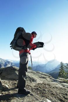 Royalty Free Photo of a Hiker in the Mountains