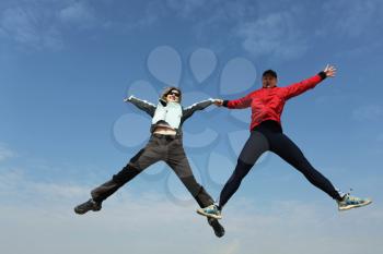 Royalty Free Photo of People Jumping