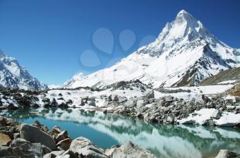 Royalty Free Photo of Shivling Peak and Lake in the Himalayas