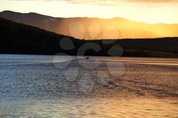 Royalty Free Photo of a Sunrise Over a Lake