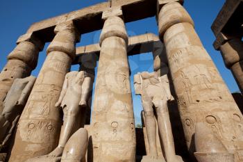 Royalty Free Photo of Statues and Pillars in Luxor, Egypt