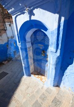 Royalty Free Photo of a Door in Chefchaouen, Morocco