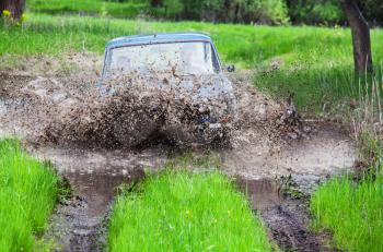 Royalty Free Photo of Truck Off Road in Mud