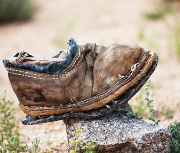 Royalty Free Photo of an Old Brown Boot