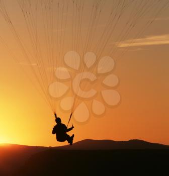 Royalty Free Photo of a Silhouette of a Paraglider