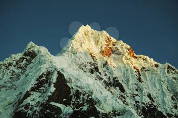 Royalty Free Photo of the Alpamayo Peak in the Cordilleras