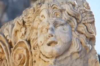 Royalty Free Photo of a Mask in the Myra Ruins, Turkey