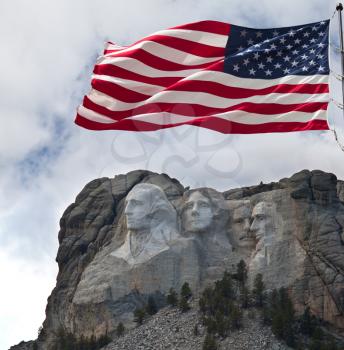 Royalty Free Photo of Mount Rushmore and American Flag