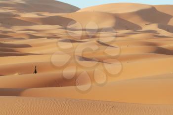 Royalty Free Photo of a Berber in the Sahara Desert