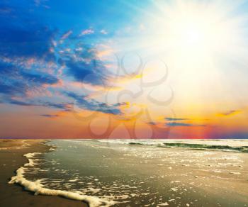 Royalty Free Photo of a Beach at Sunset