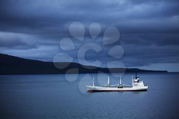 Royalty Free Photo of a Ship Near the Faroe Islands