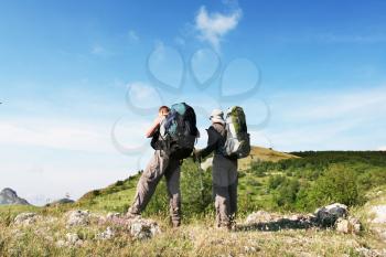 Royalty Free Photo of Backpackers  in Crimean mountain