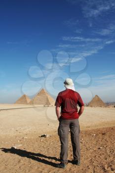 Man look on pyramid