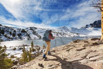 Man with hiking equipment walking in Sierra Nevada  mountains,California,USA