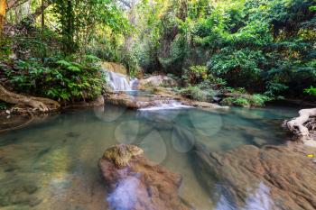 Beautiful waterfall in rainforest, Kanchanaburi province, Southeast asia, Thailand