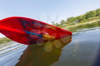 Red paddle for  rafting and kayaking
