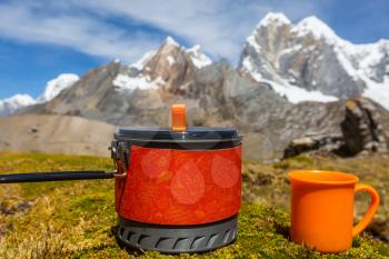 Tea set in high mountains. Hiking scene in Cordillera Huayhuach, Peru.