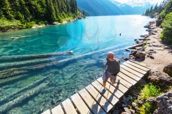 Hike to turquoise waters of picturesque Garibaldi Lake near Whistler, BC, Canada. Very popular hike destination in British Columbia.