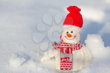 Pretty Snowman on snowy background