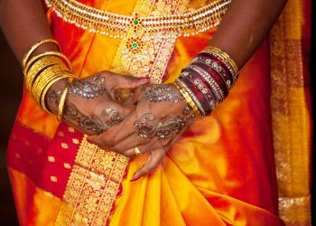  bangles, rings and wedding pattern on hands 
