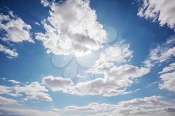 Sunny background, blue sky with white clouds, natural background.