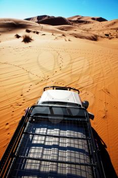 4x4 vehicle driving off road in Sahara desert, Morocco, Africa