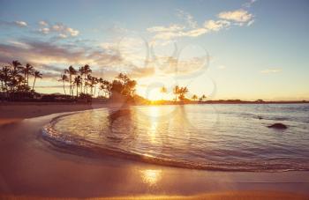 Amazing hawaiian beach at fantastic sunset. Beautiful holidays background.