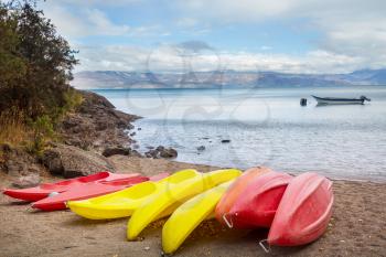 Kayak on lake shore, Patagonia, Chile.