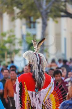 Native American dancers show their traditional dances on the central square of San Salvador 