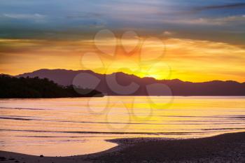 Serenity tropical sunset on beautiful sandy beach