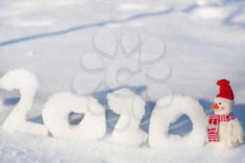 Pretty Snowman on snowy New Year 2020  date background 
