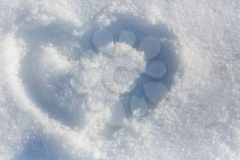 The shape of heart on the snow
