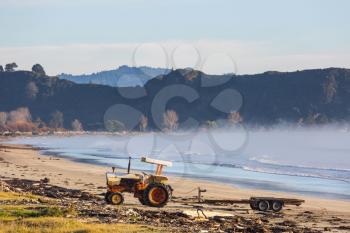 Tractor on the beach in New Zealand