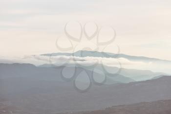 Mountains silhouette  in Cyprus in the misty morning