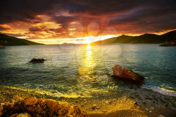 Scenic colorful sunset at the sea coast. Good for wallpaper or background image.
