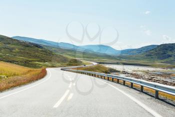 Road in Norway mountains in summer season