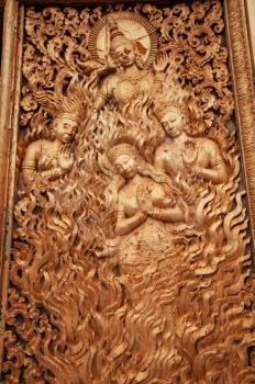 Religious carvings in buddhist temple in Laos