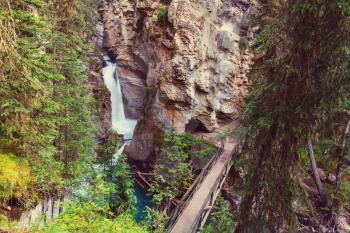 Johnston Canyon in Banff NP, Canada. Beautiful natural landscapes in British Columbia. Summer season. 