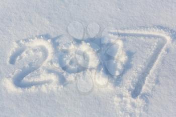 new years date 2017 written in snow