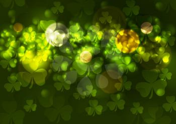 Green blurred bokeh background with clovers. St. Patrick Day vector design