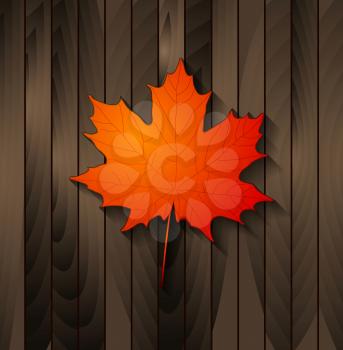 Autumn maple leaf on wooden background. Vector design
