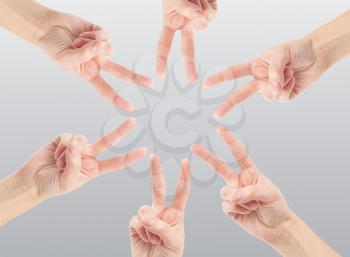 Royalty Free Photo of People's Hands Forming a Star