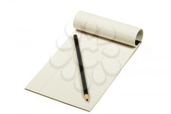 Royalty Free Photo of a Pencil on a Notepad
