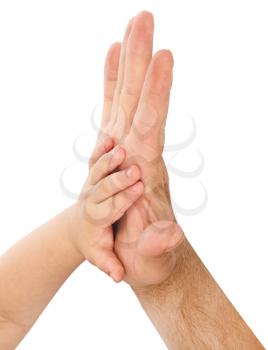 Royalty Free Photo of a Father Holding His Child's Hand