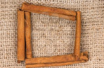 Royalty Free Photo of a Frame of Cinnamon Sticks